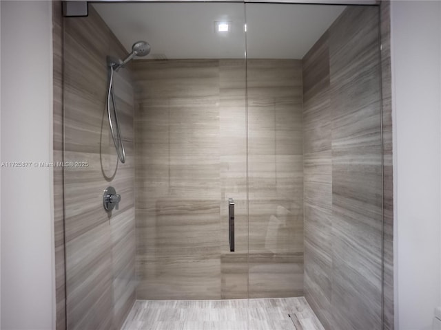 bathroom with an enclosed shower