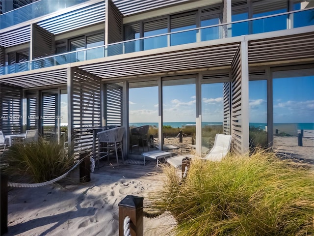 view of patio featuring a water view