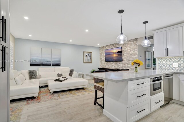 living room featuring light hardwood / wood-style flooring