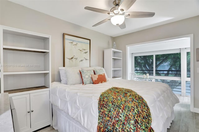 bedroom featuring ceiling fan, light hardwood / wood-style floors, and access to exterior