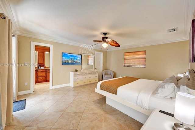 bedroom featuring ensuite bathroom, light tile patterned floors, ceiling fan, and crown molding