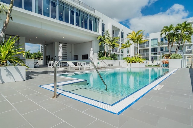 view of pool featuring a patio