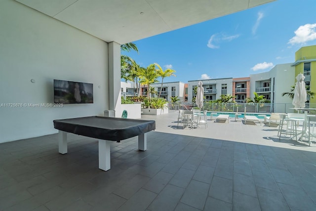 view of patio with a community pool