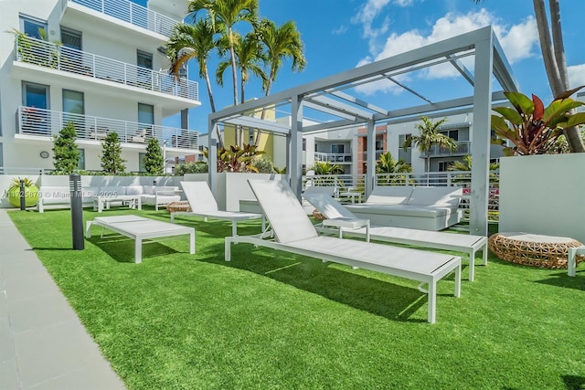 exterior space featuring a lawn and a pergola