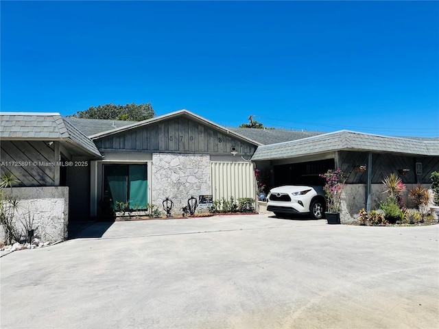 view of side of property with a garage