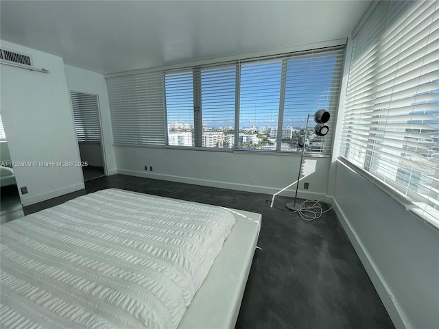 bedroom featuring multiple windows