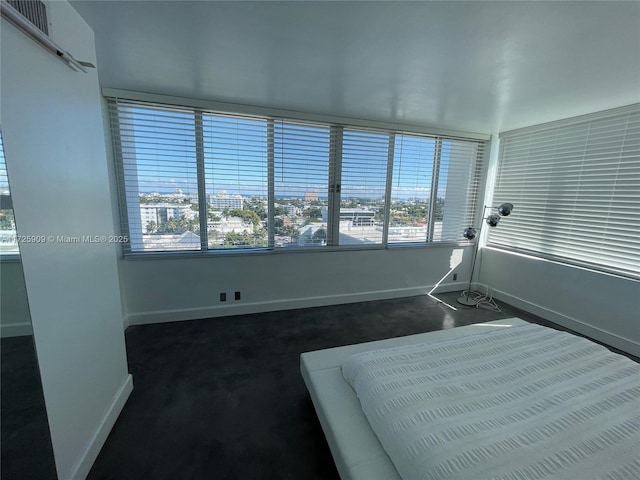 bedroom featuring multiple windows