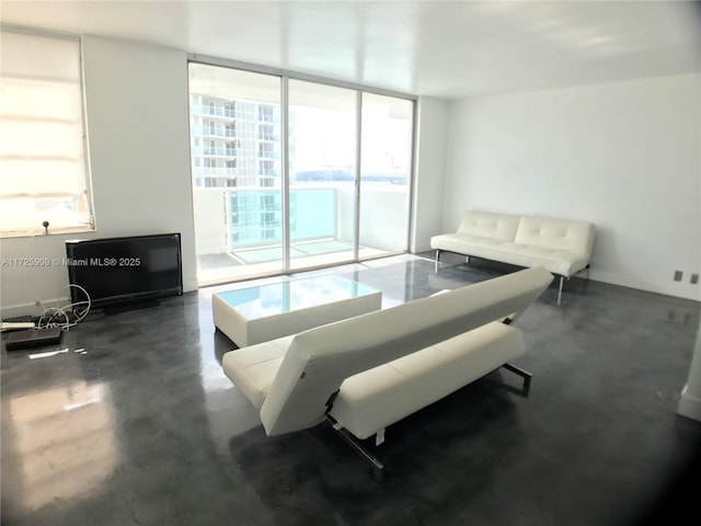 living room with floor to ceiling windows