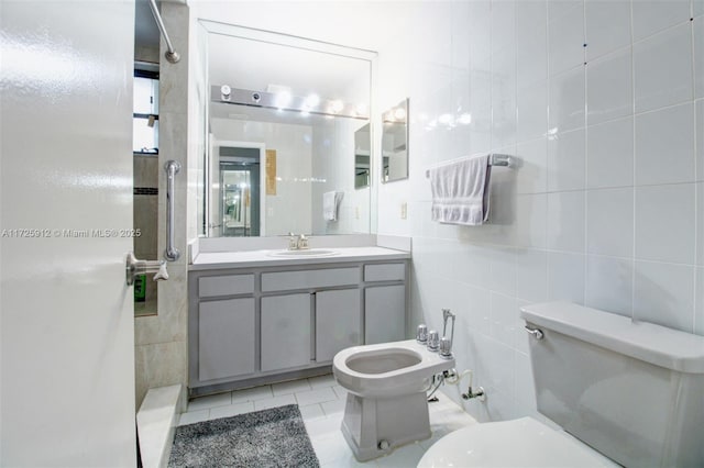 full bath featuring tile patterned floors, toilet, tile walls, and vanity