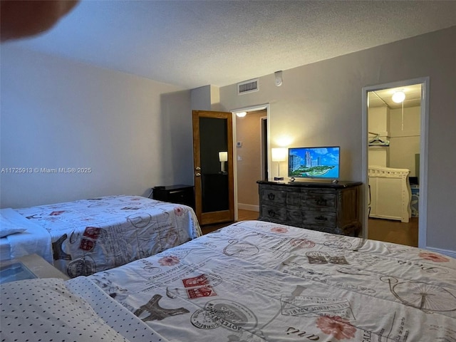 bedroom with a textured ceiling