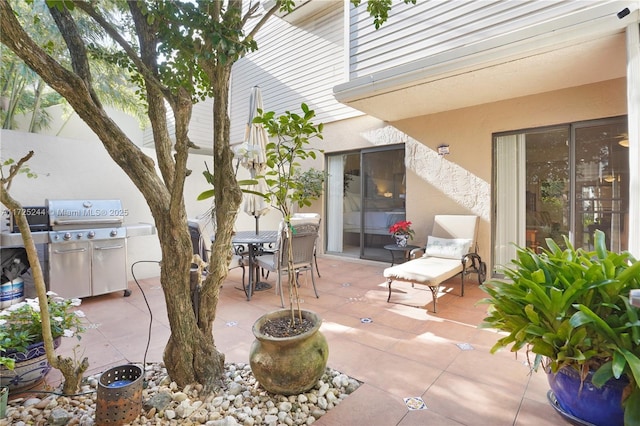 view of patio with a grill