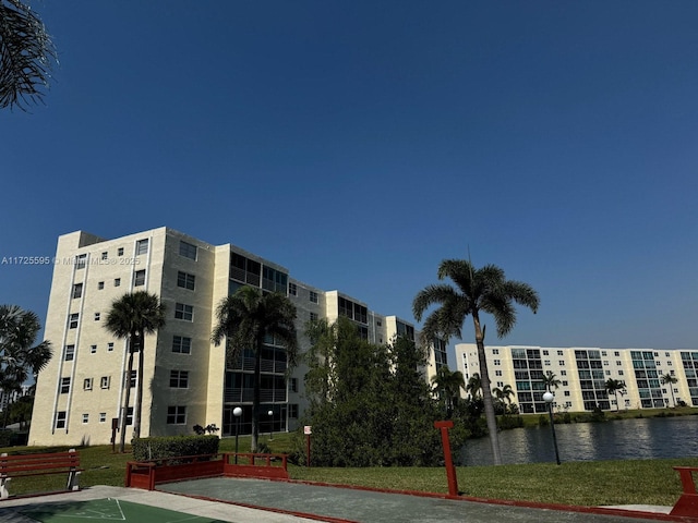 view of building exterior with a water view