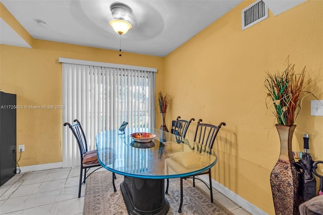 dining area with ceiling fan