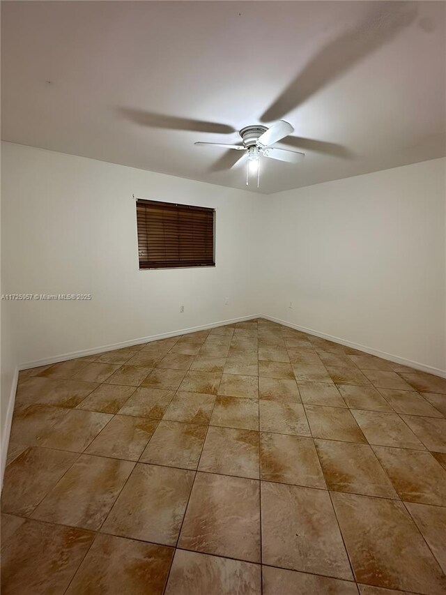 kitchen featuring sink, light tile patterned flooring, a fireplace, and stainless steel fridge with ice dispenser