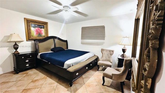 bedroom with ceiling fan and light tile patterned floors