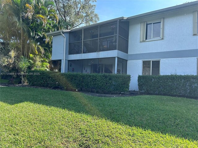 entrance to property featuring central AC