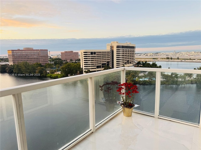 balcony at dusk with a water view