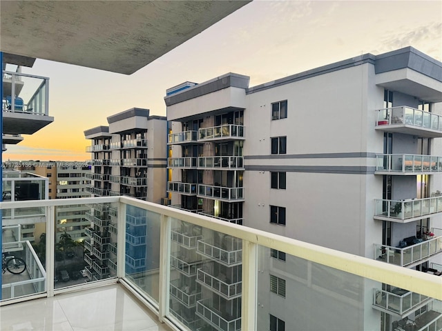 view of balcony at dusk