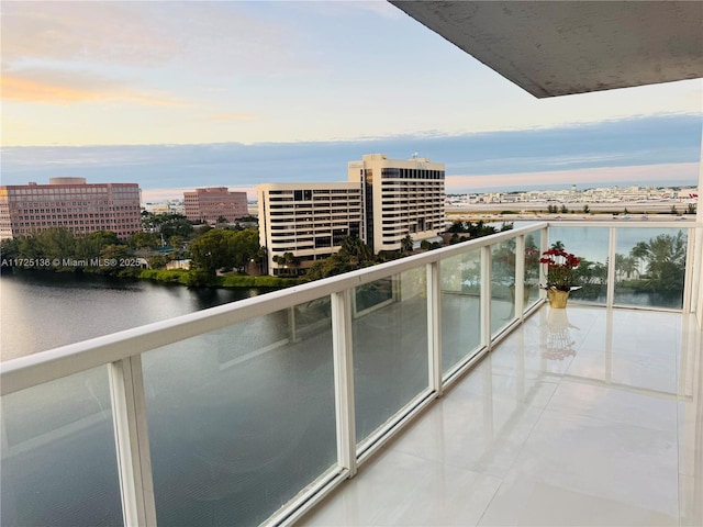 balcony at dusk with a water view