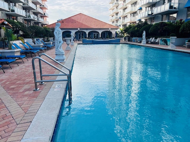 view of swimming pool featuring a patio