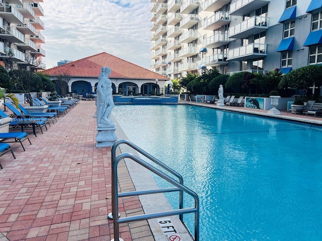 view of pool with a patio