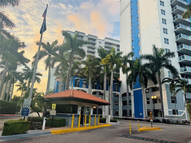 view of outdoor building at dusk