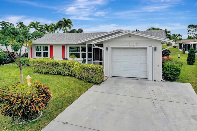 ranch-style house with a front yard and a garage