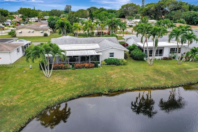 bird's eye view with a water view