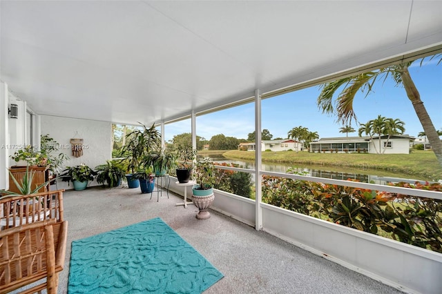 sunroom with a water view