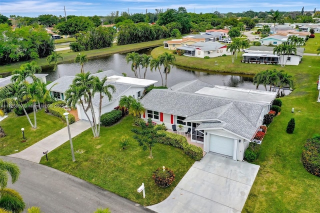 bird's eye view with a water view