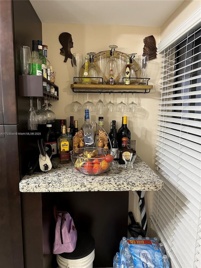 bar with light stone countertops