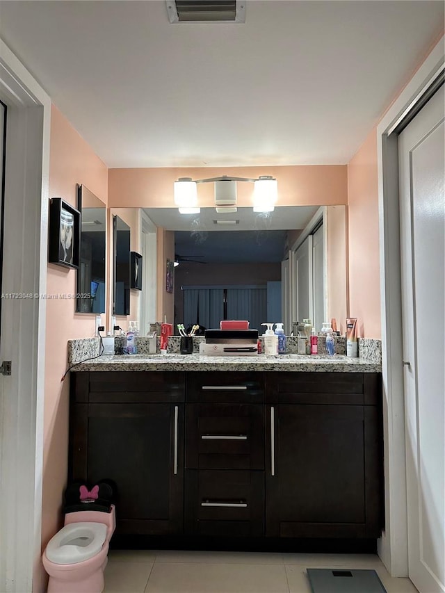 bathroom featuring vanity and tile patterned floors