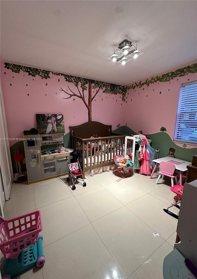 tiled bedroom with a crib