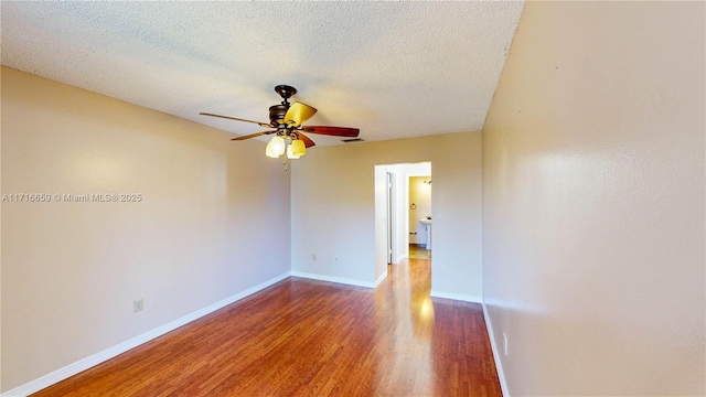 empty room with hardwood / wood-style floors, a textured ceiling, and ceiling fan