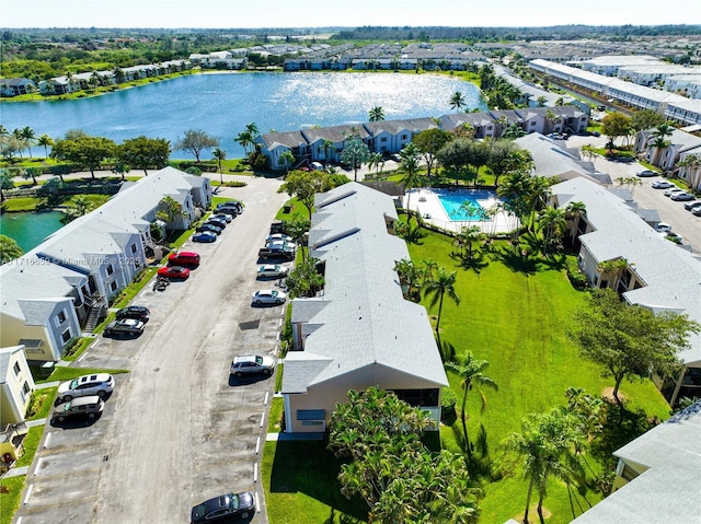 birds eye view of property featuring a water view