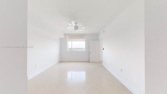 unfurnished room featuring ceiling fan