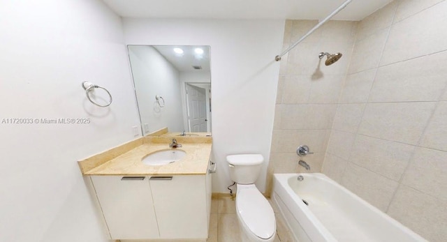 full bathroom with toilet, tiled shower / bath combo, and vanity