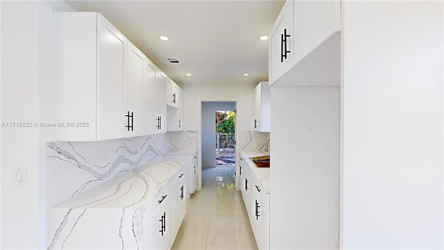 mudroom featuring light tile patterned floors