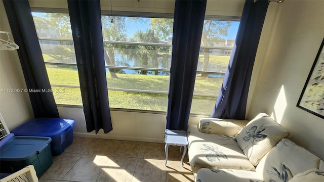 sunroom with a water view