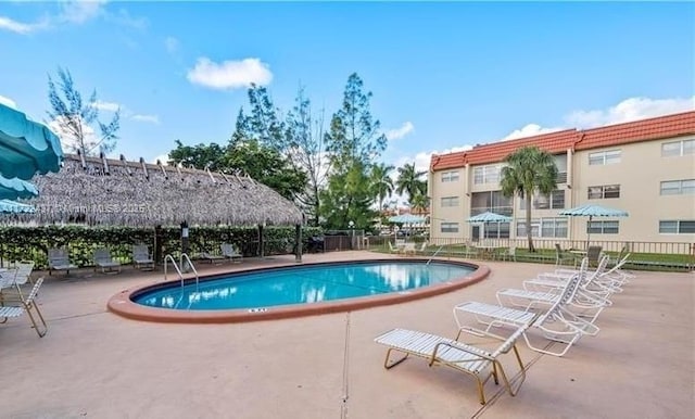 view of swimming pool featuring a patio