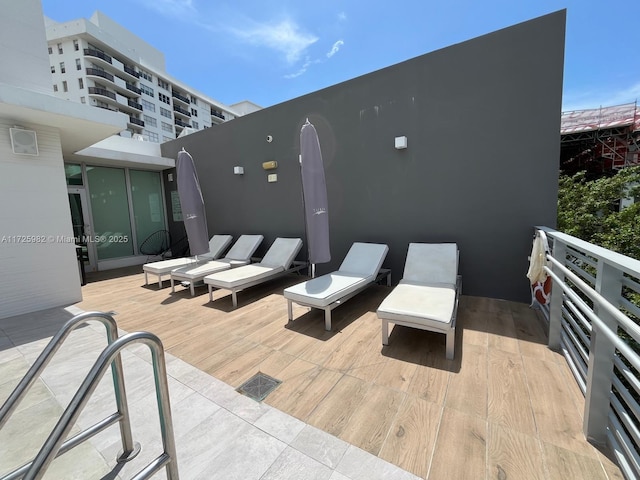 view of patio with a balcony