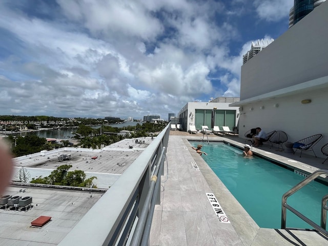 view of pool with a patio area