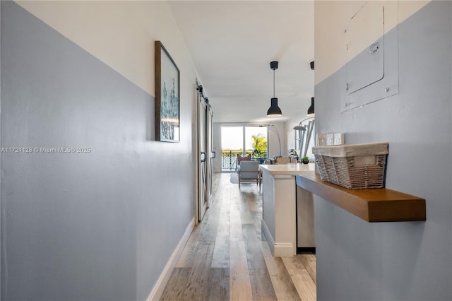 hallway featuring light hardwood / wood-style floors