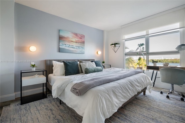 bedroom featuring hardwood / wood-style flooring