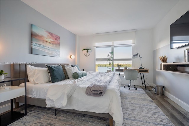 bedroom featuring dark hardwood / wood-style floors