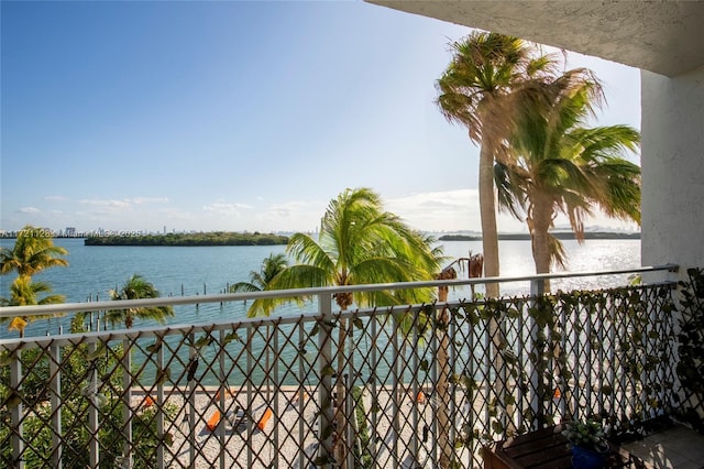 balcony featuring a water view