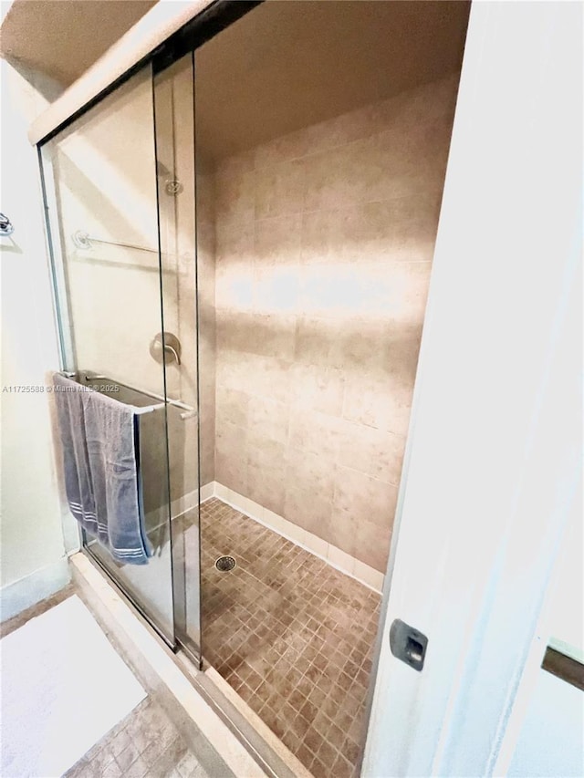 bathroom with an enclosed shower