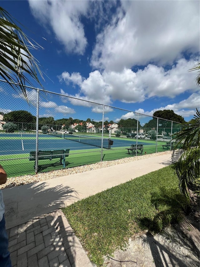 10 Via De Casas Sur Unit 205, Boynton Beach, FL 33426 - view of home's community featuring a tennis court and fence
