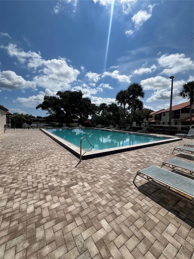 10 Via De Casas Sur Unit 205, Boynton Beach, FL 33426 - pool featuring a patio area
