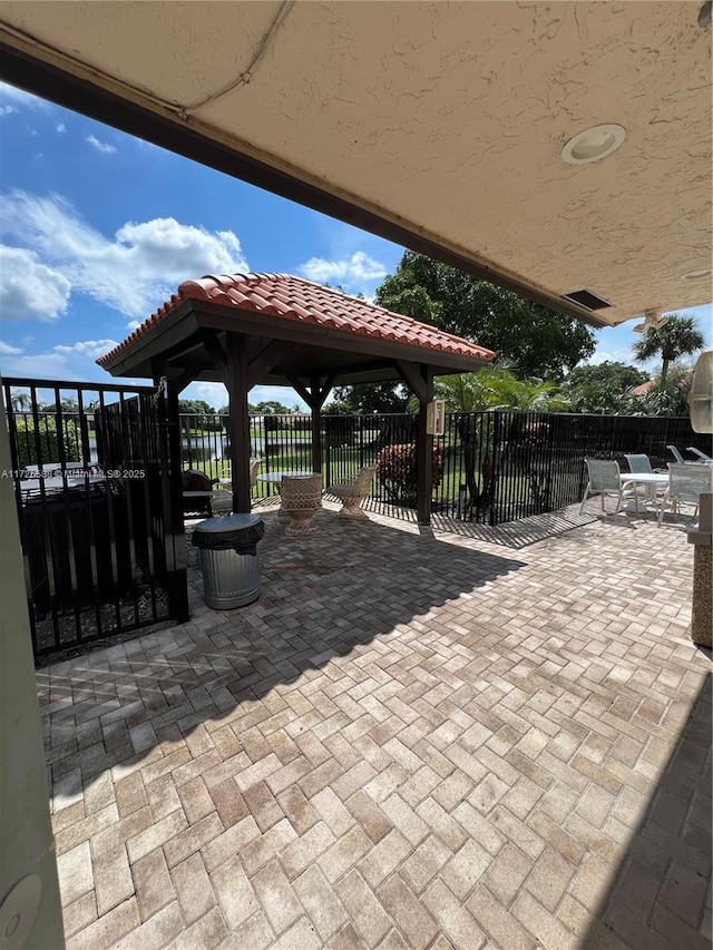 10 Via De Casas Sur Unit 205, Boynton Beach, FL 33426 - view of patio featuring fence